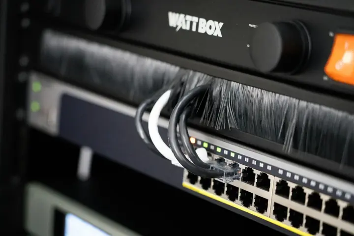 Network switch and patch cables in an equipment rack
